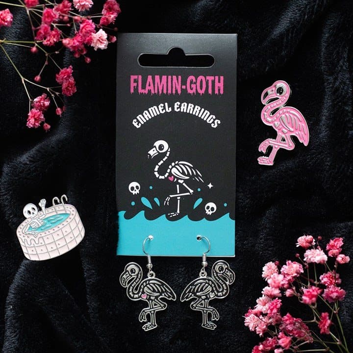 Gothic dangle earrings with skeletal flamingo charms and a pink heart
