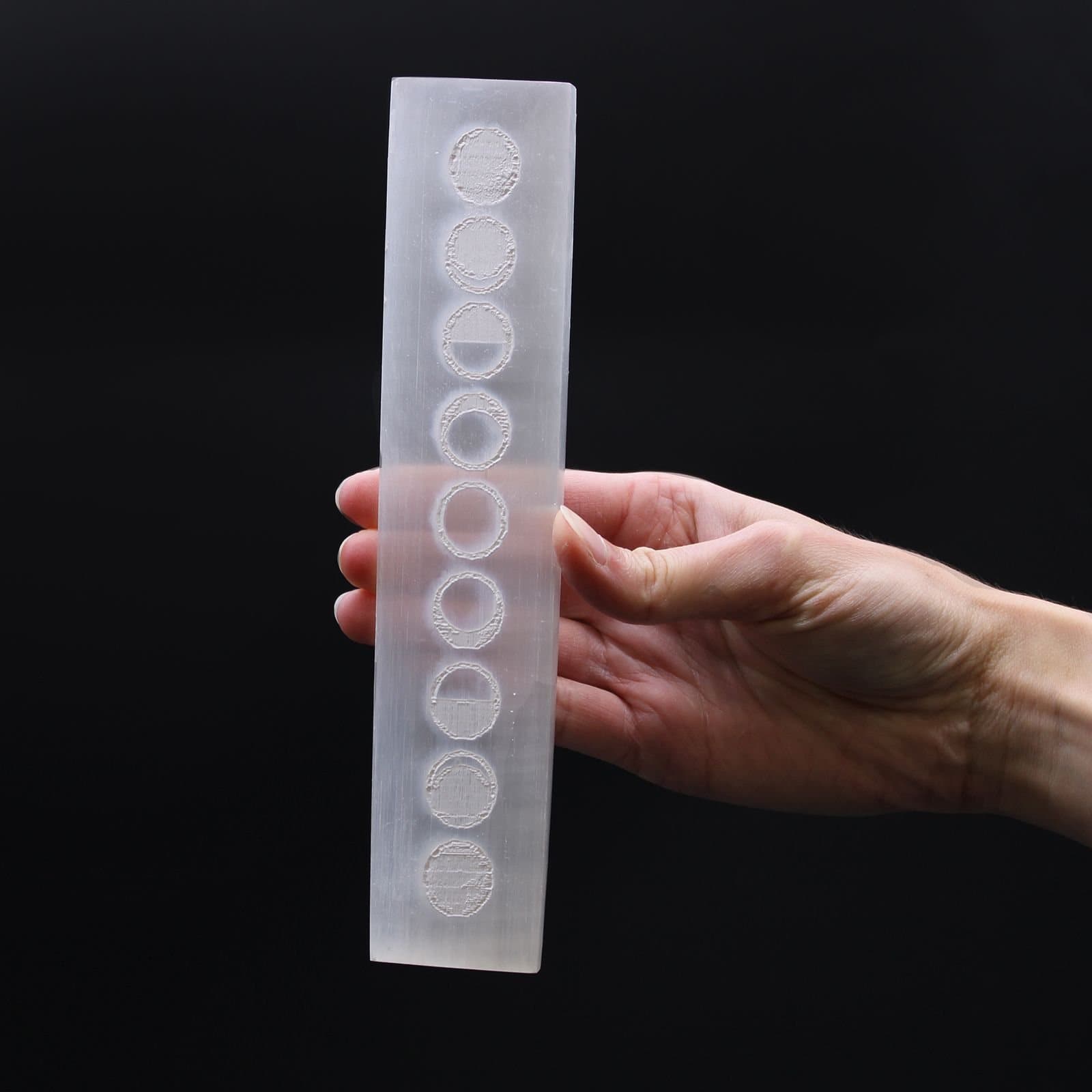 Flat bar selenite charging plate with a Moon Cycles design