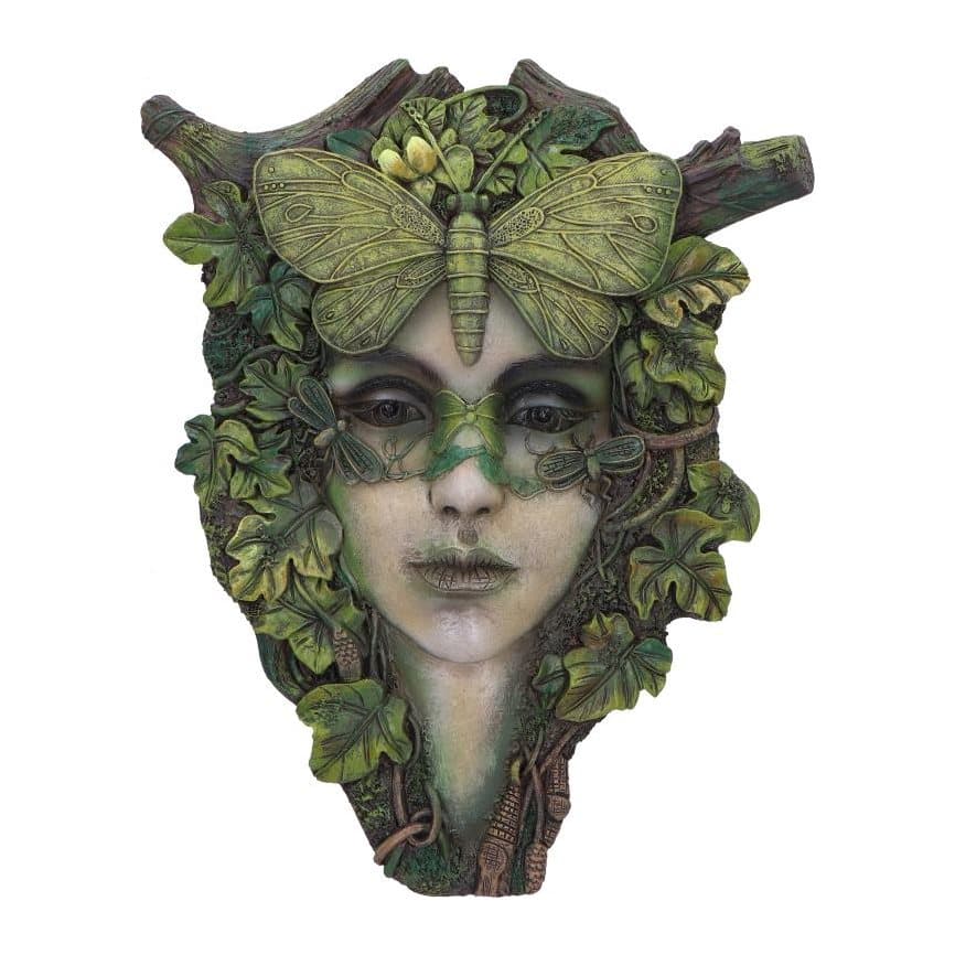 Wall plaque of a woman's face with green foliage and a large butterfly on her forehead