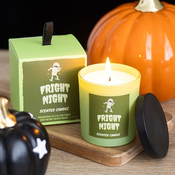 Lime and ginger scented Halloween candle with its colour cardboard box