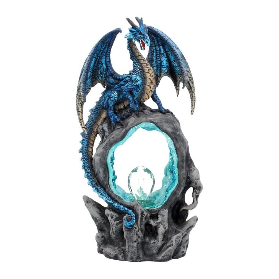 Blue dragon figurine over a grey geode with sapphire crystals