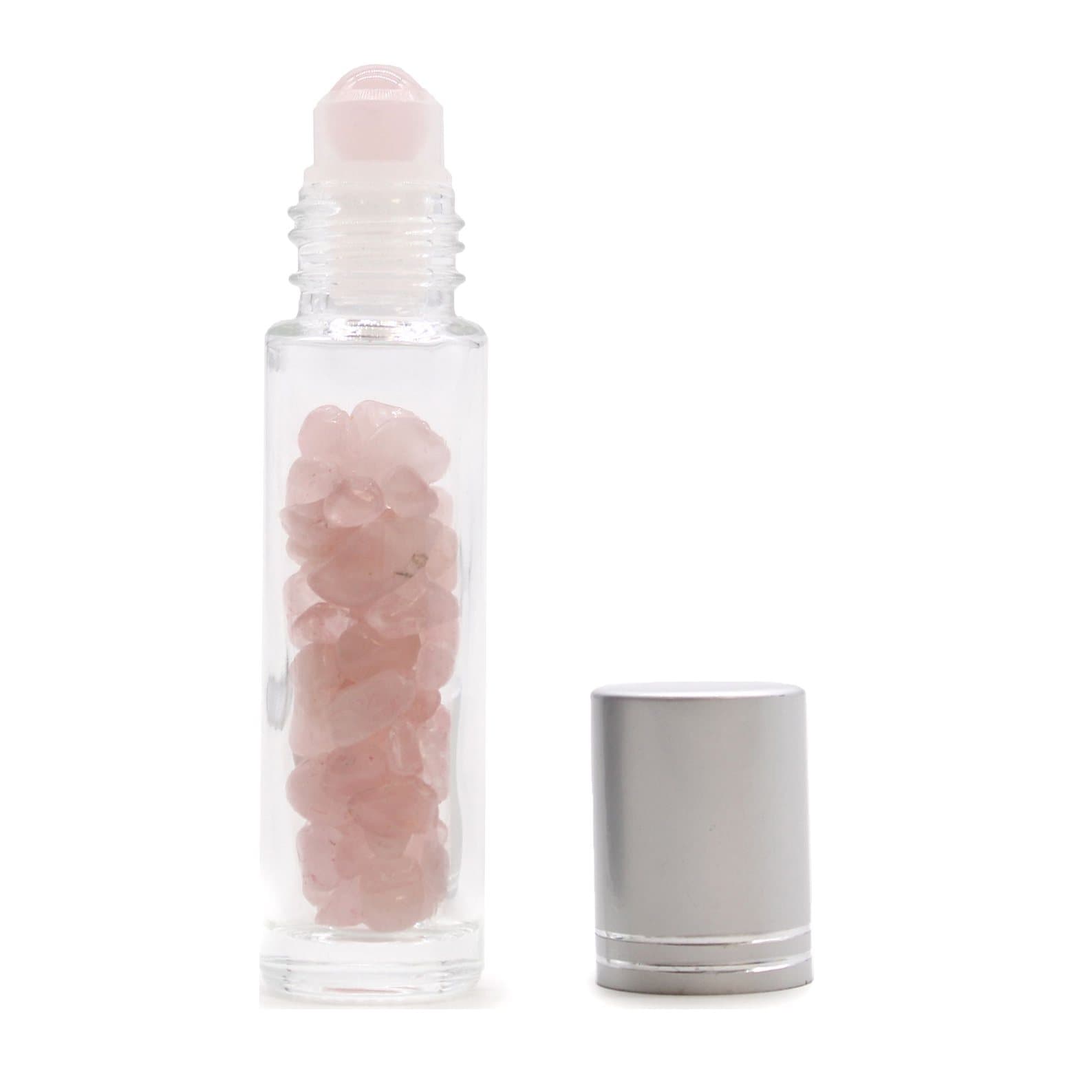 Roller bottle with a polished rose quartz ball and silver cap