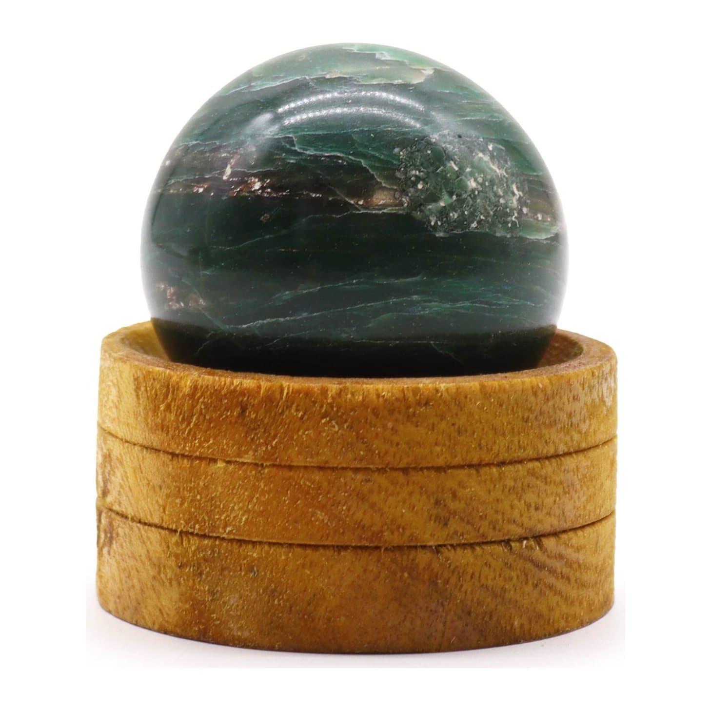 Indian jade gemstone sphere resting on a stand