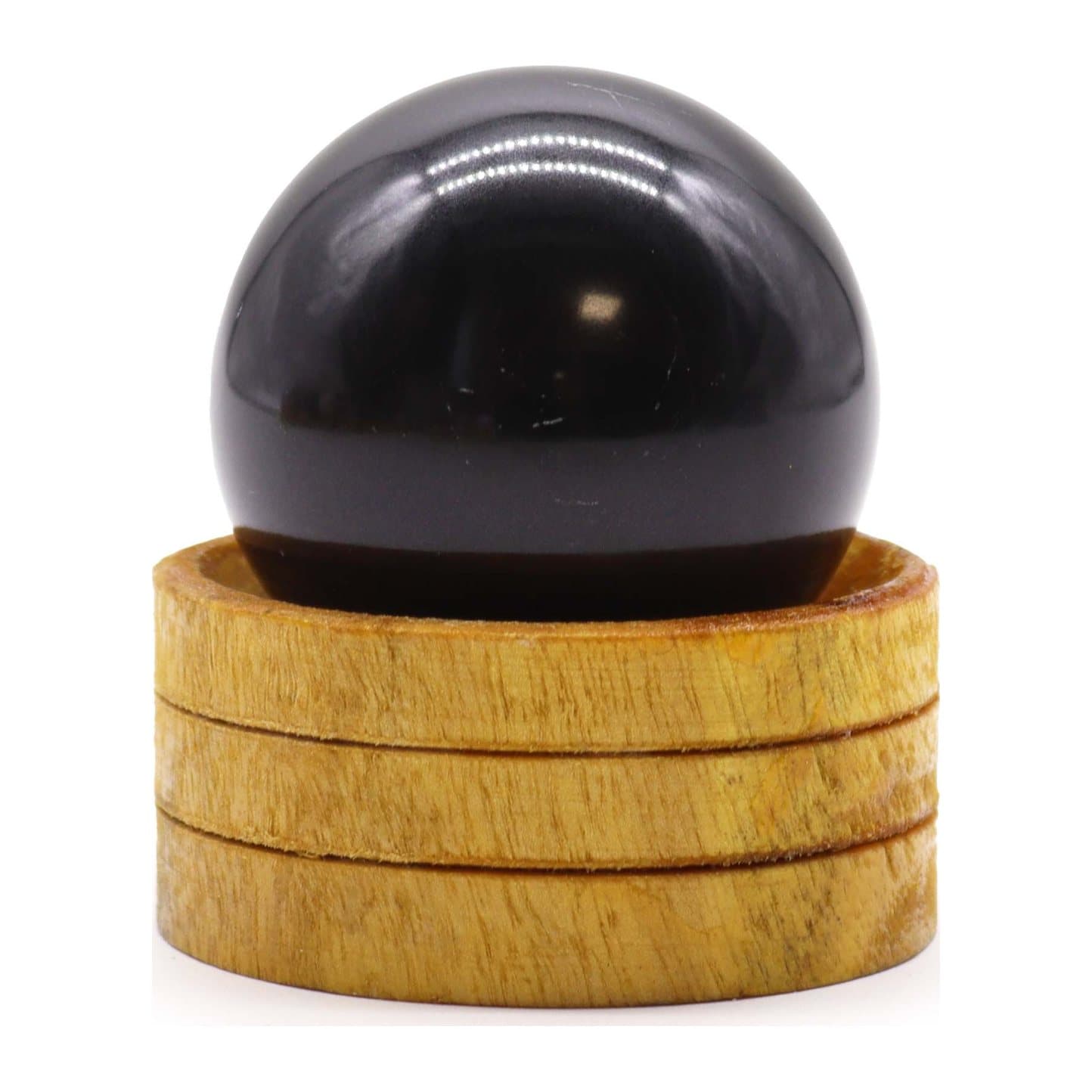 Tourmaline gemstone sphere resting on a stand