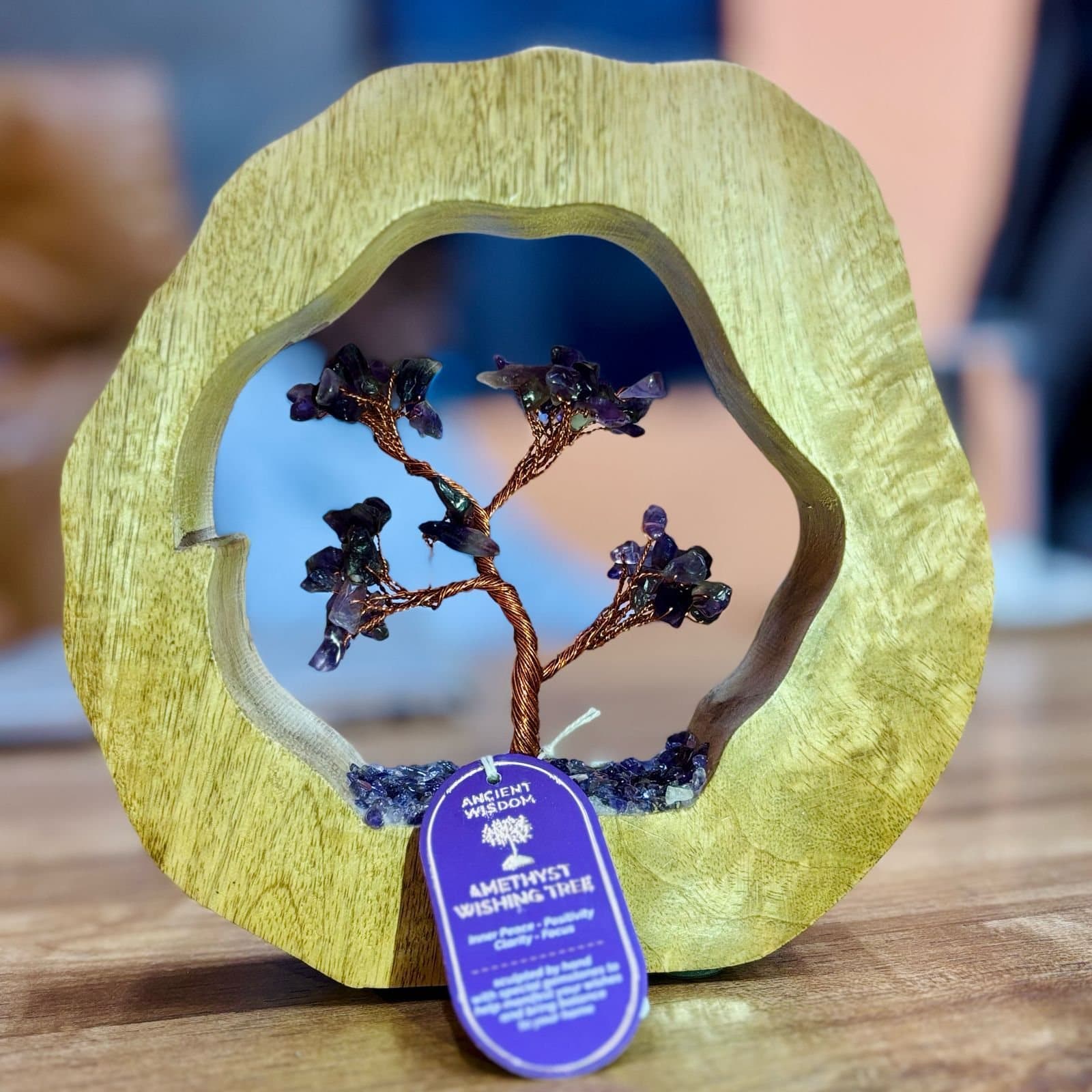 Amethyst gemstone tree set in a carved mango wood ring