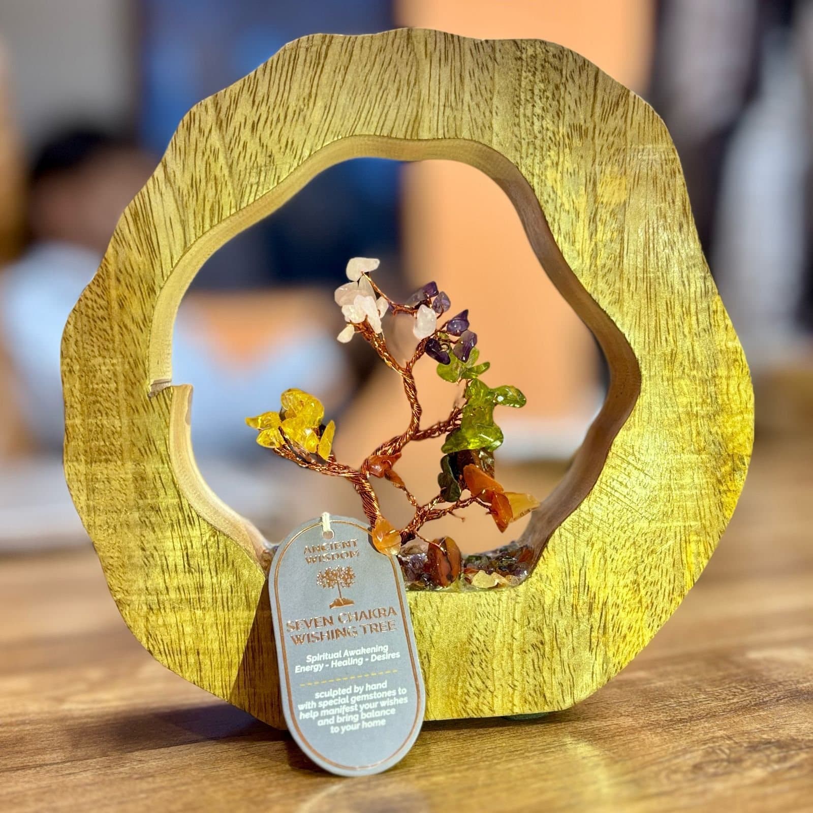 Gemstone tree with chipstones on a mango wood ring under a glass dome