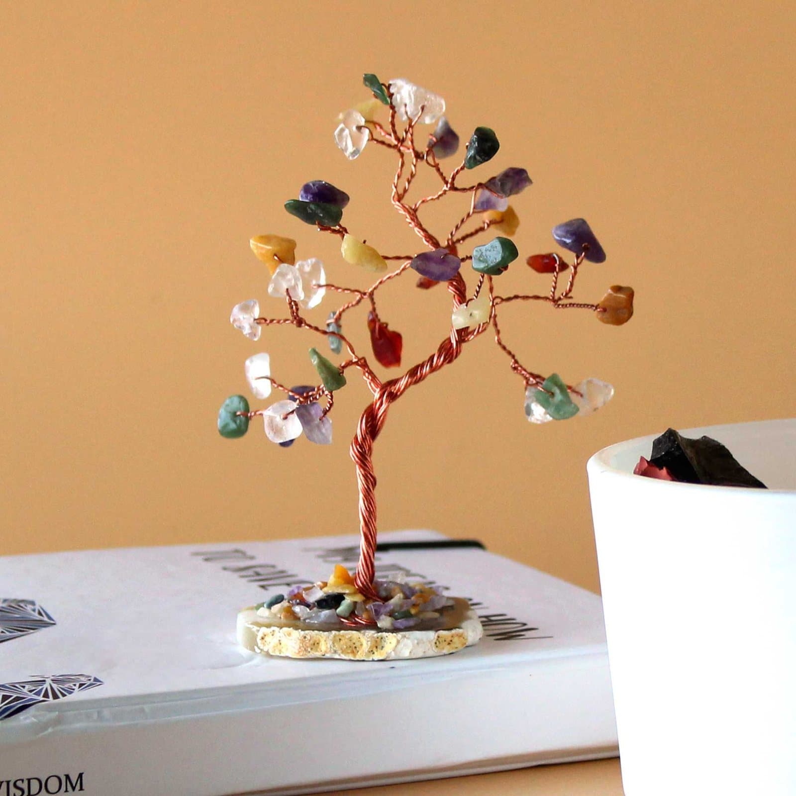 Gemstone tree of multi-coloured stones on a natural agate base