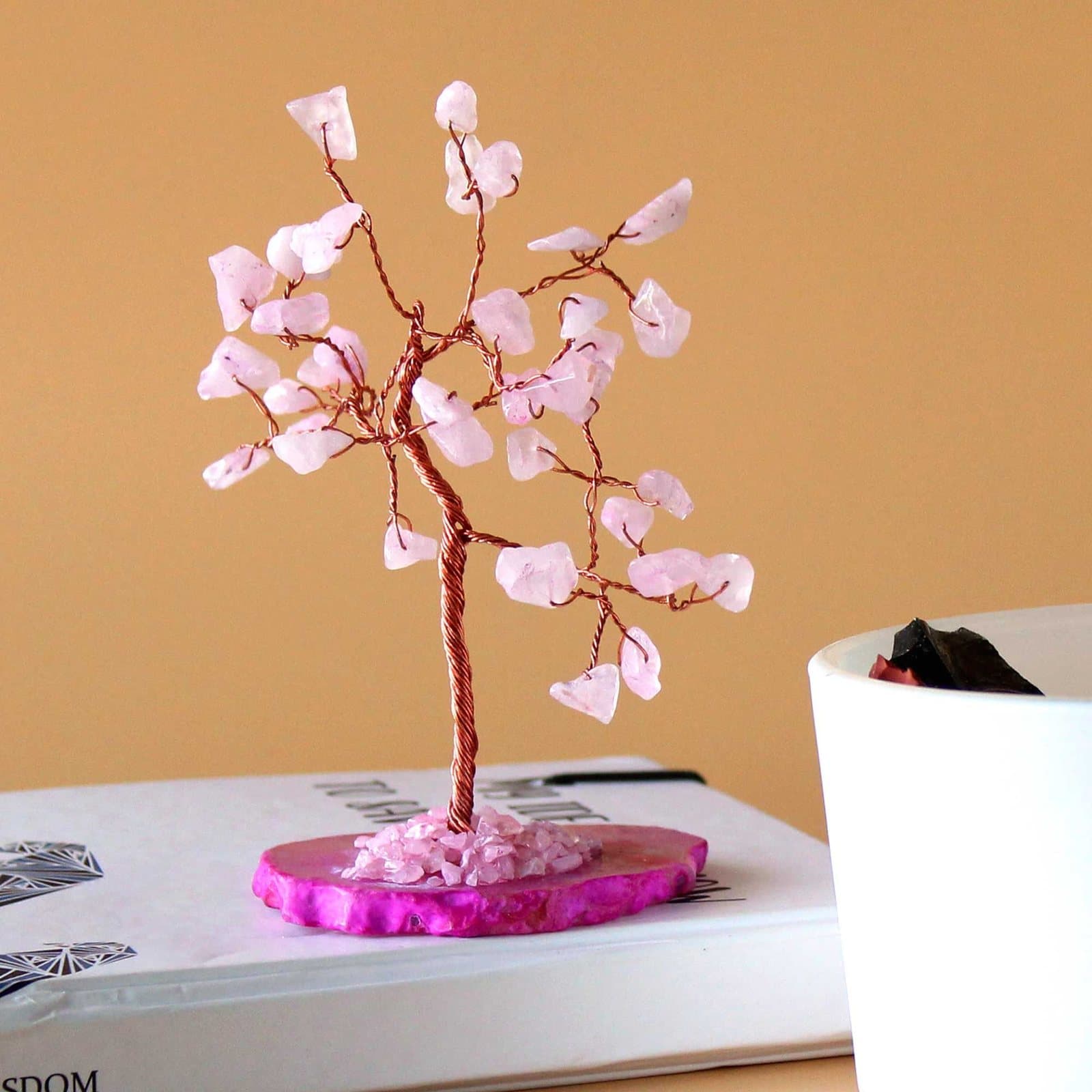 Rose quartz gemstone tree on a pink agate base