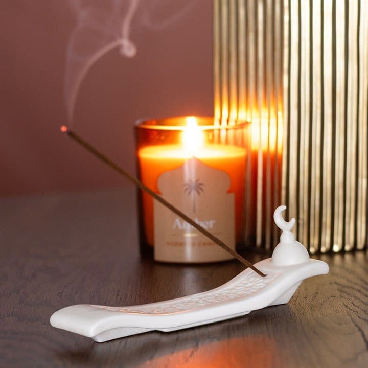 Cream ceramic crescent moon incense ash catcher with a geometric pattern