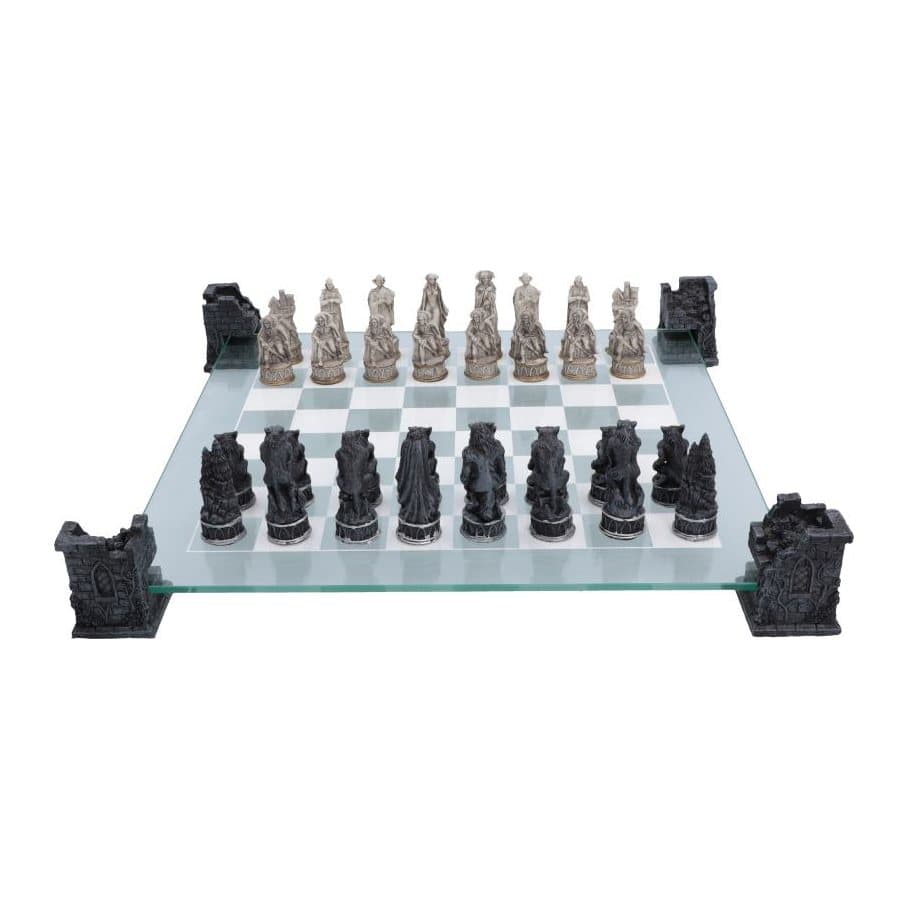 Gothic chess set with vampire and werewolf pieces on a raised glass board