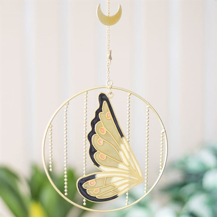 Gold-tone hanging decoration with crescent moon, star and green fairy wing