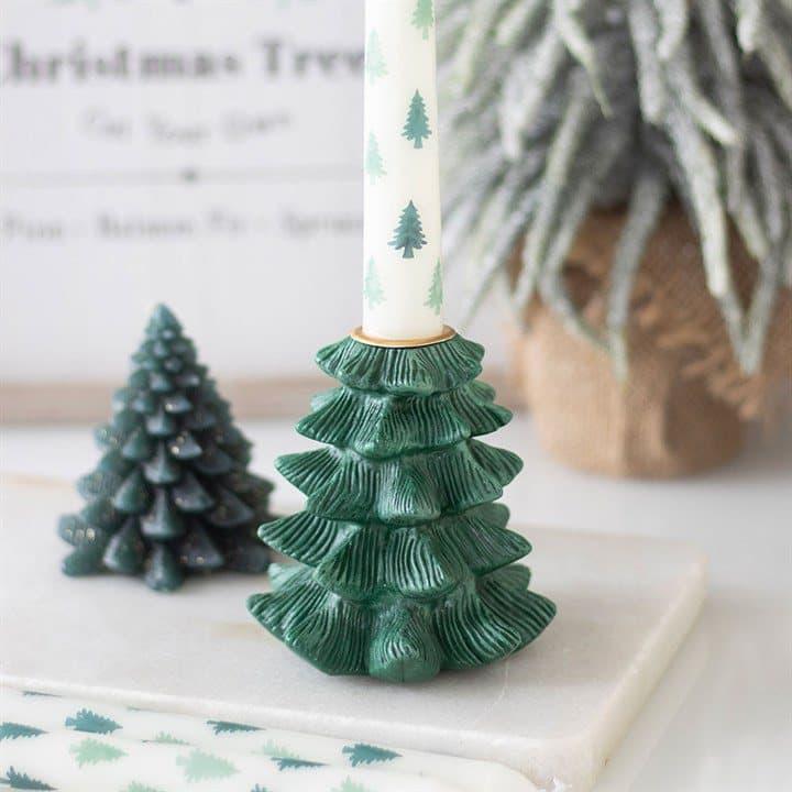 Green fir tree resin candle holder with a taper candle