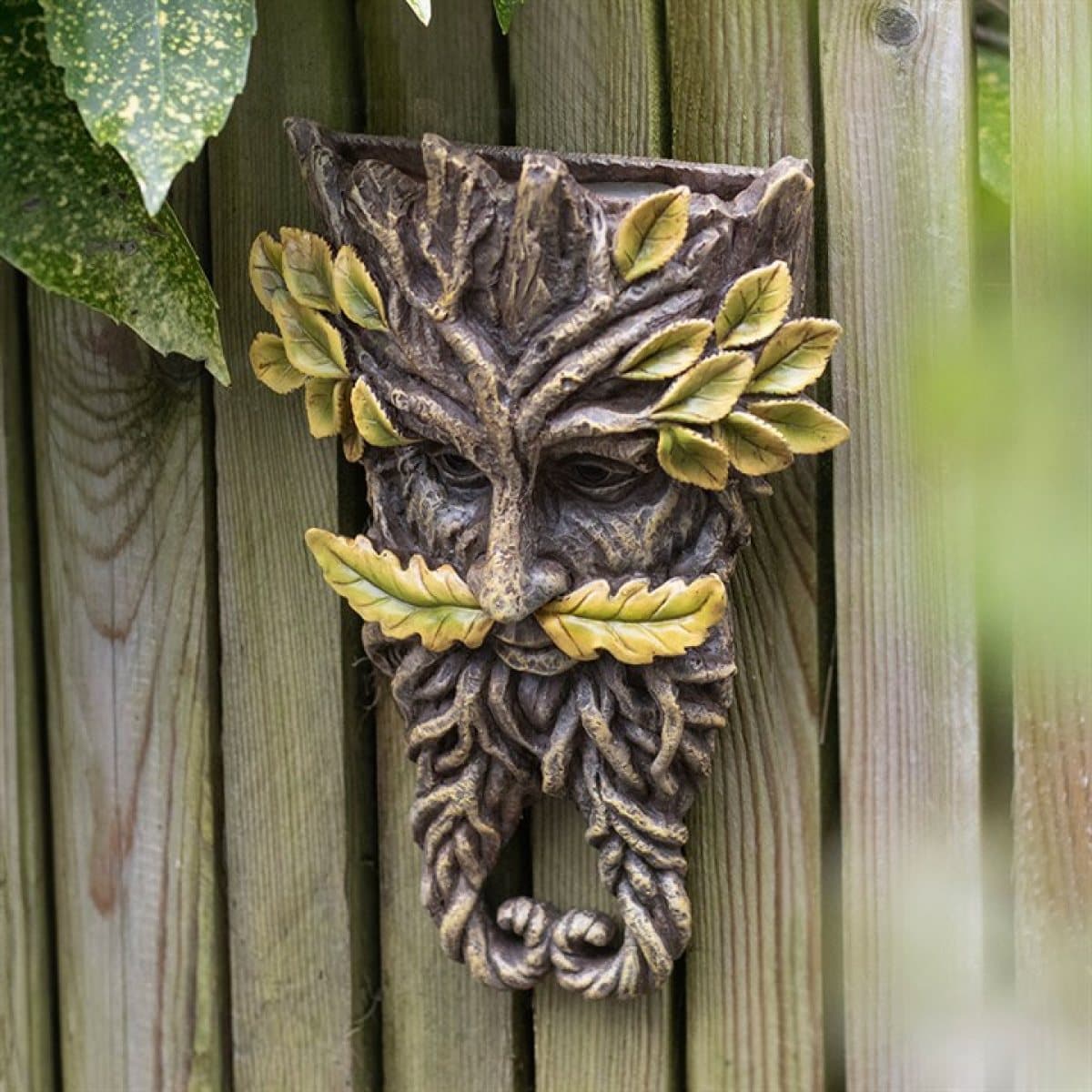 Green Man resin wall plaque with twisted beard and yellow oak leaves
