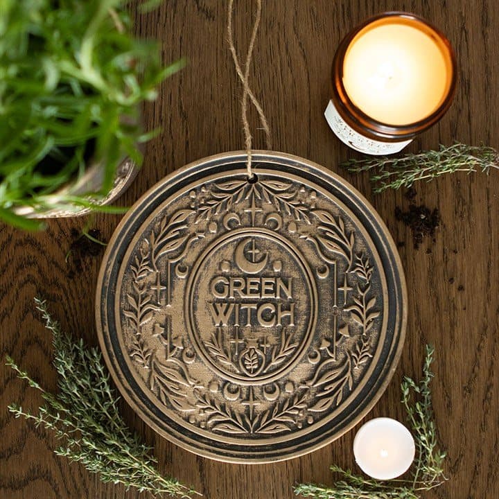 Bronze-effect terracotta hanging plaque with the Green Witch design