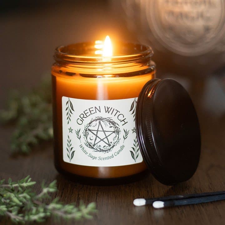 Amber glass jar candle scented with white sage