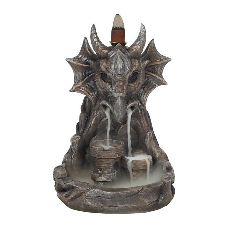 Grey resin dragon backflow incense burner with horned dragon face and small castle