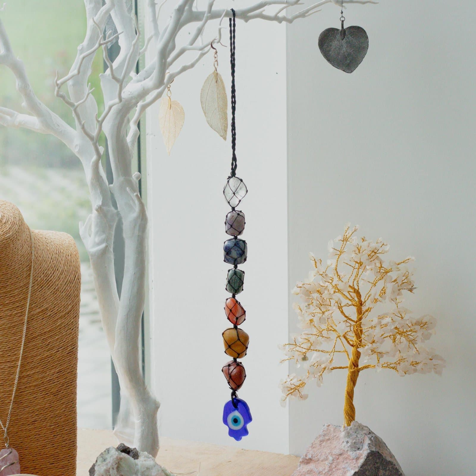 Hanging chakra stone pendant with gemstones, named Hansa