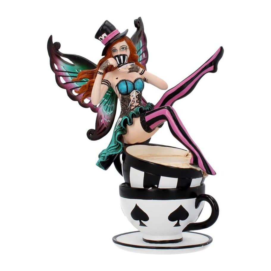 Hatter fairy with red hair and top hat perched on a large teacup