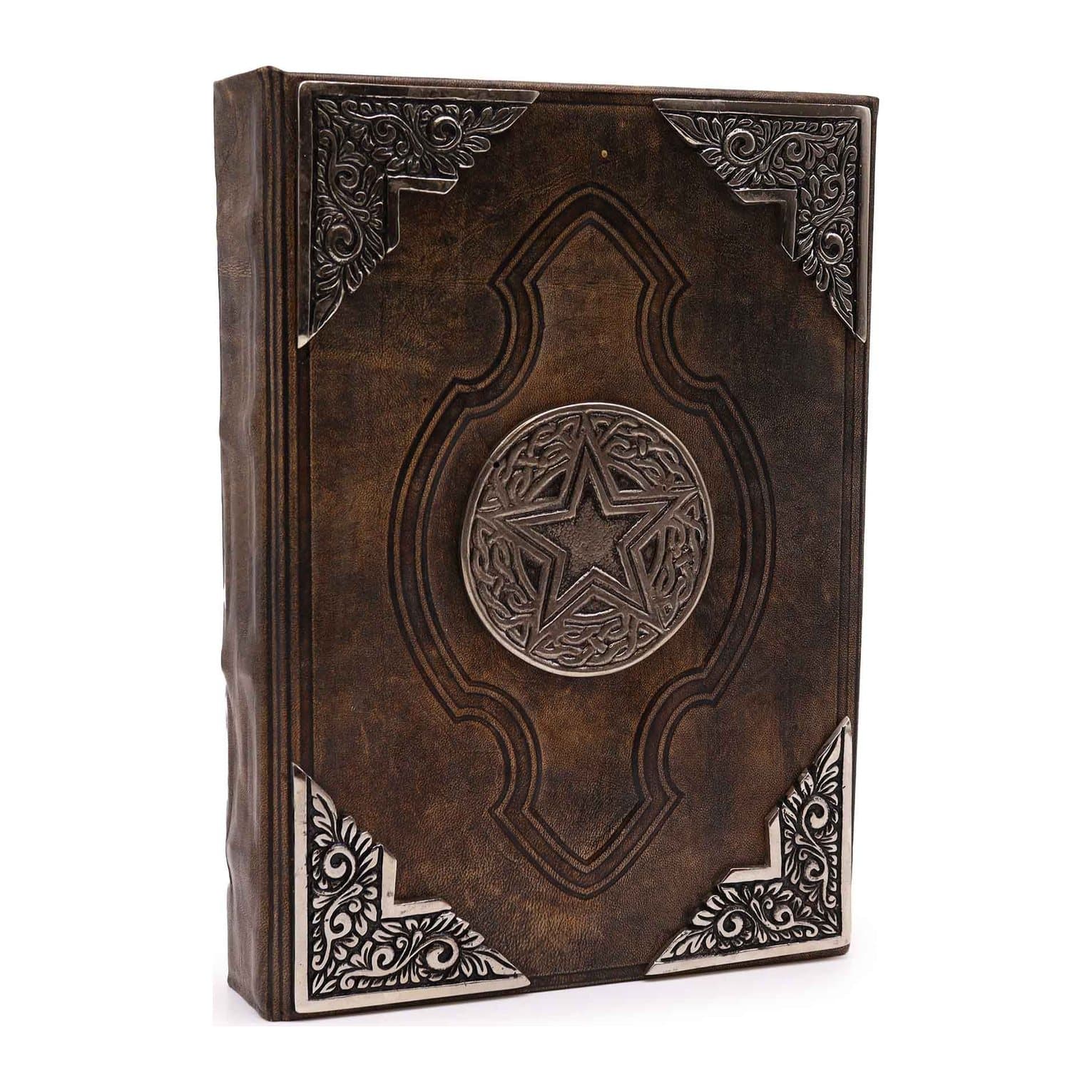 Brown tan leather notebook with a zinc pentagon on the cover