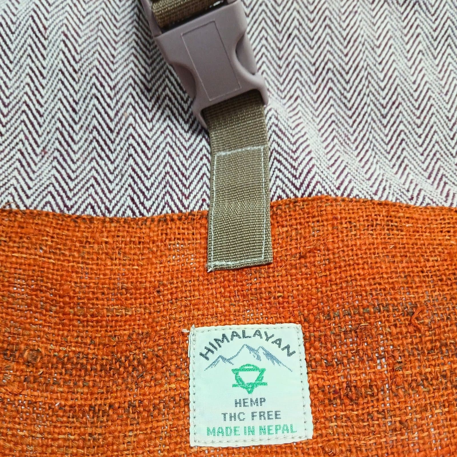 Hemp trekking rolling backpack in Sunset Orange