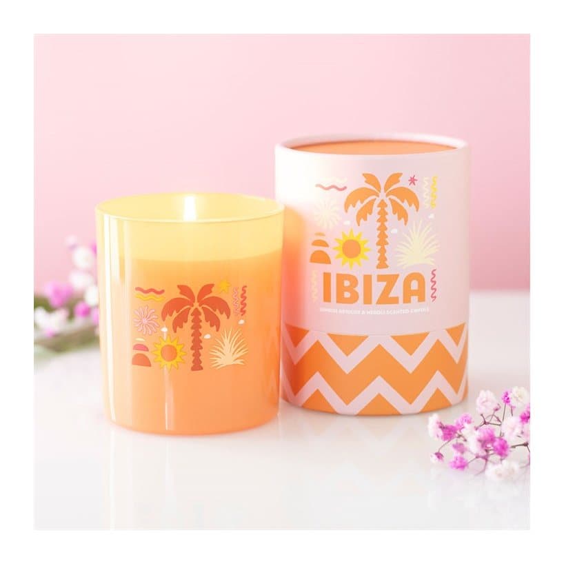 Ibiza Sunrise apricot and neroli scented candle with its colour cardboard box