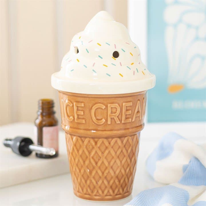Ceramic ice cream cone oil burner with swirl-effect lid