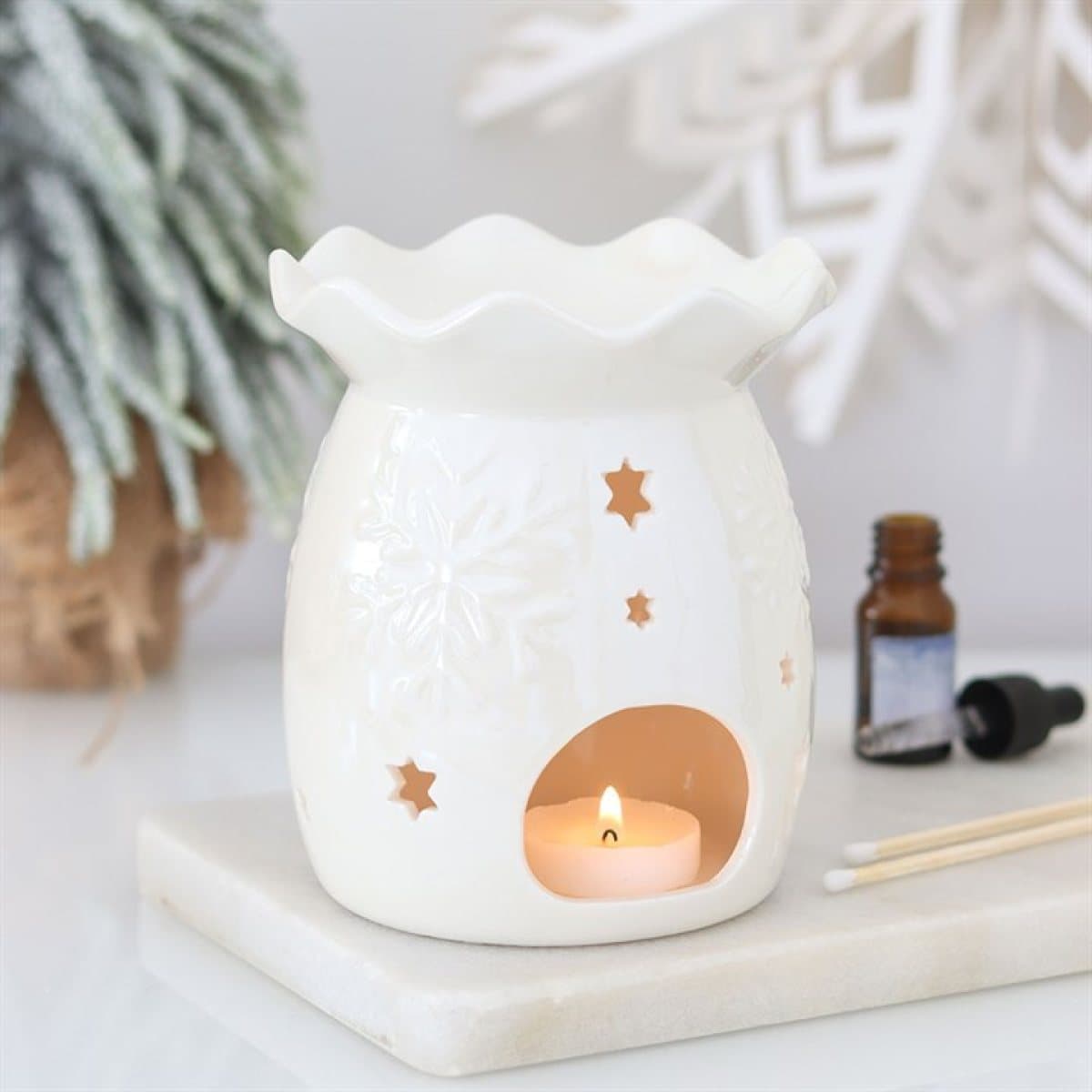 Iridescent ceramic snowflake oil burner and wax warmer with cut-out details