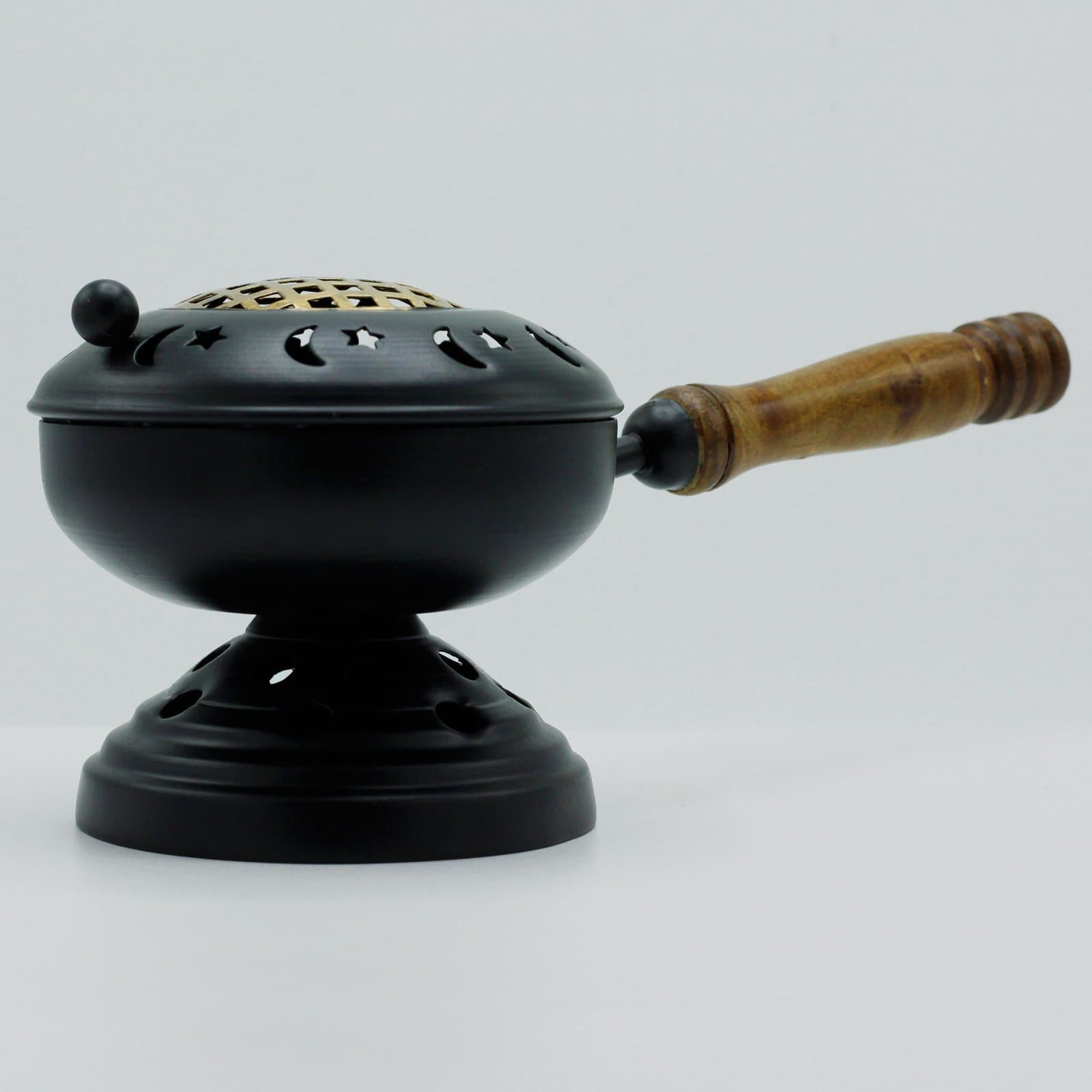 Large black iron censer on a stand with gold accents