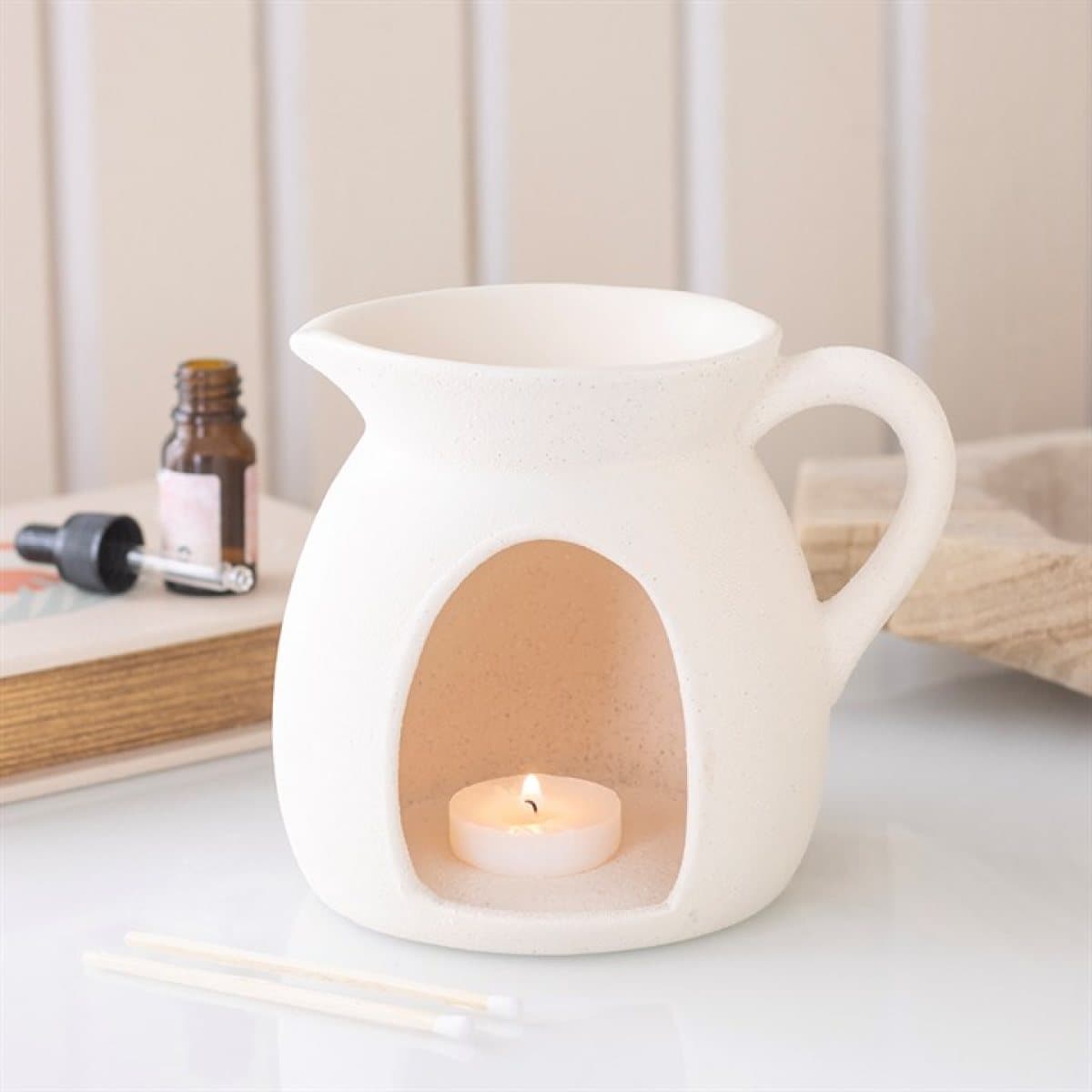 Ceramic oil burner and wax warmer in a classic jug shape