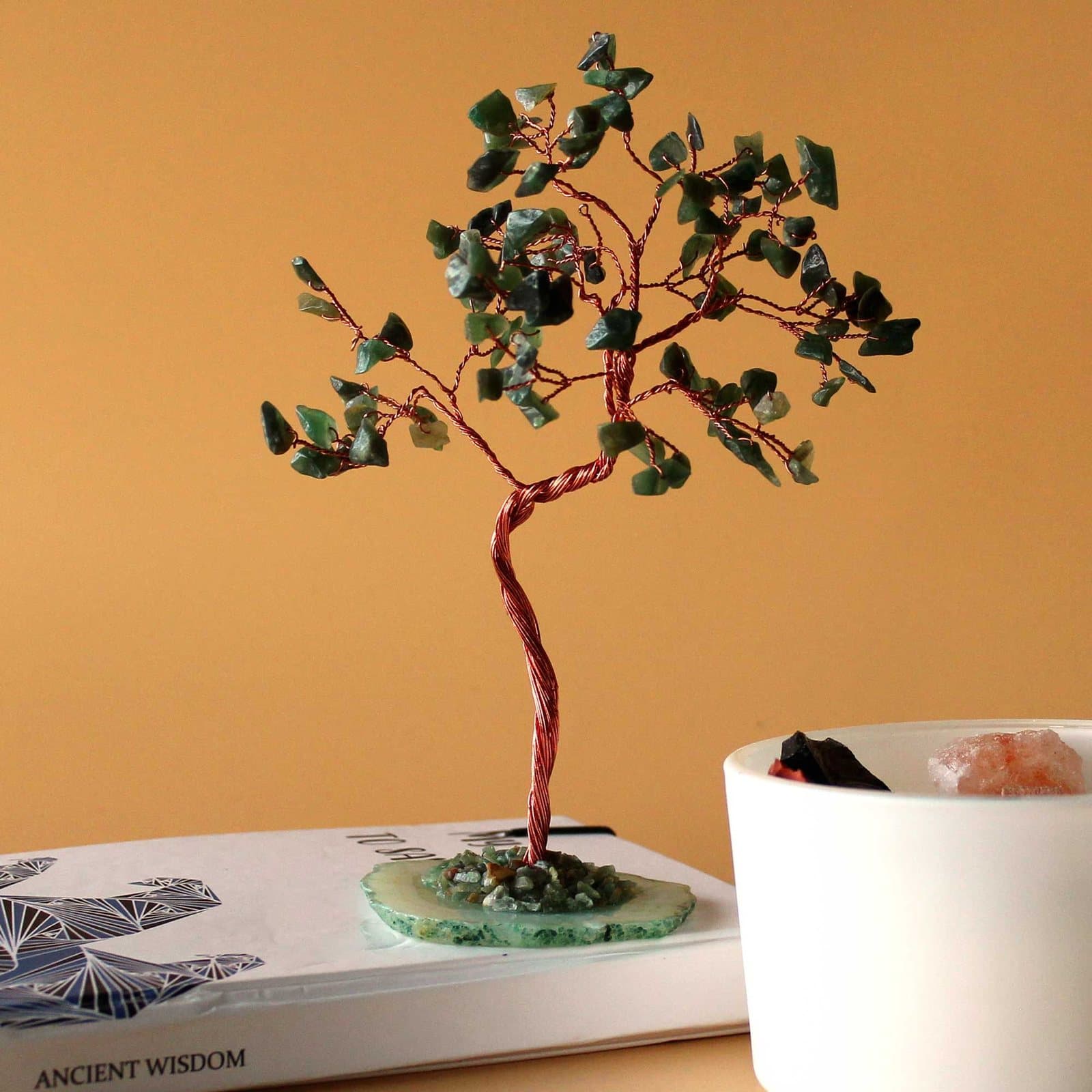 Gemstone tree of green aventurine stones on a green agate base