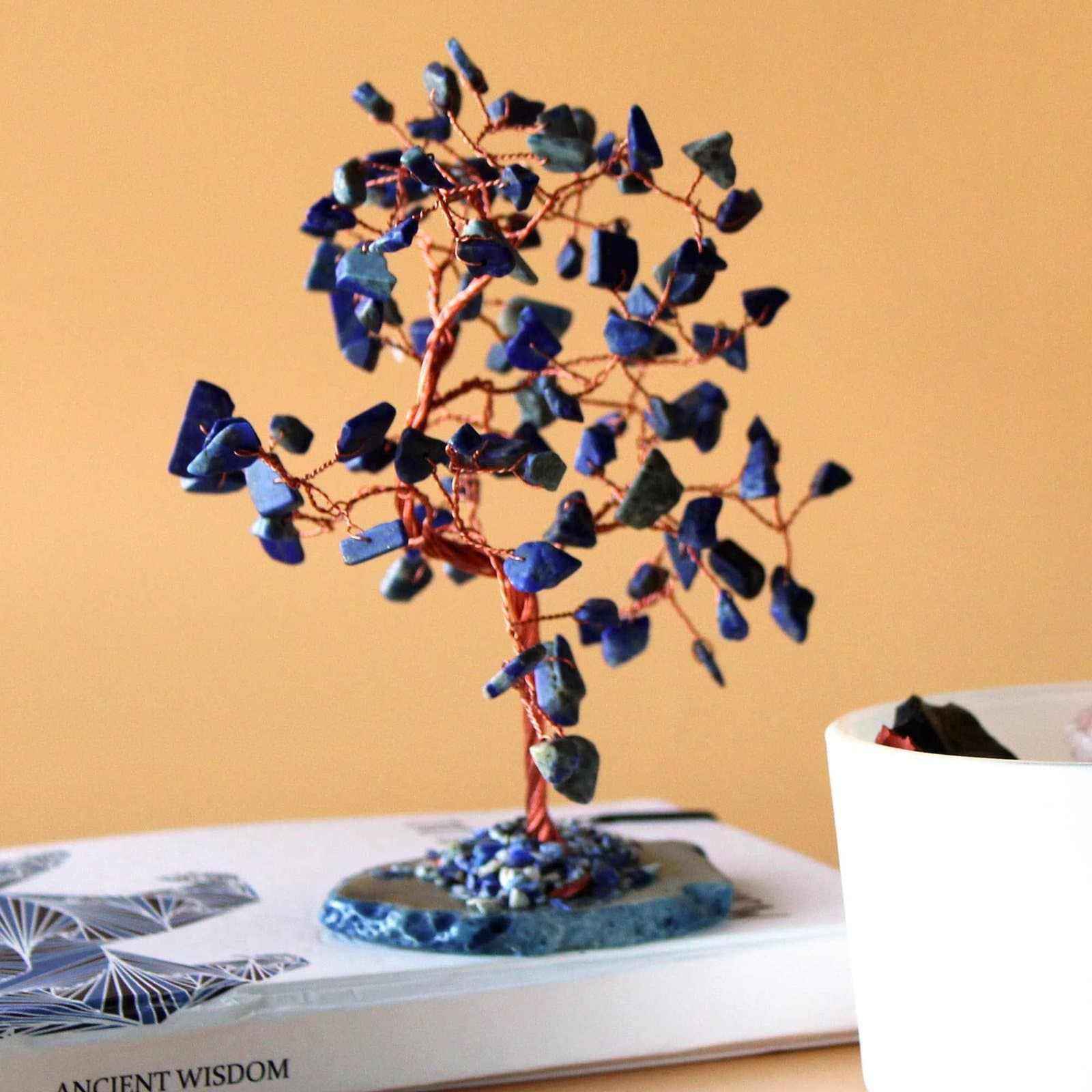 Large sodalite gemstone tree on a blue agate base