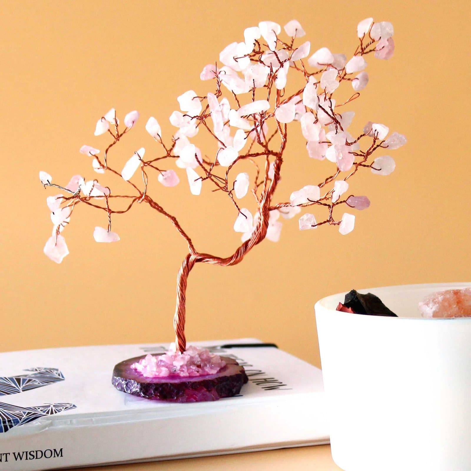 Rose quartz gemstone tree with 100 pink stones on a pink agate base