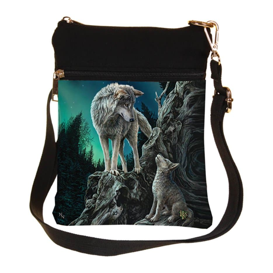 Shoulder bag with a wolf and pup under a starlit aurora sky