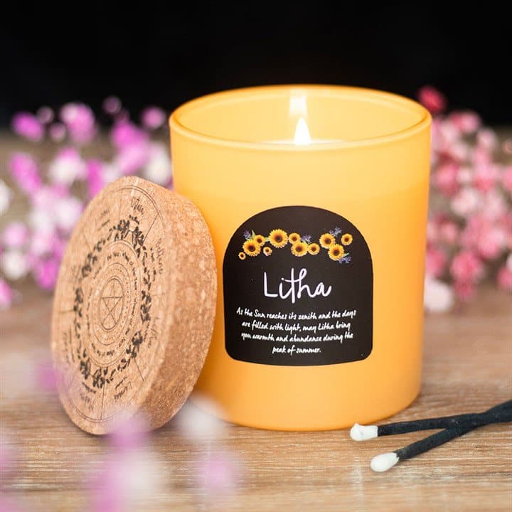 Litha wildflower candle in a glass jar with a cork lid
