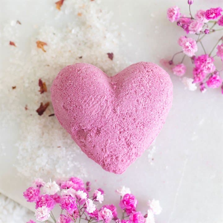 Heart-shaped cherry bath bomb in a colour cardboard box with a window