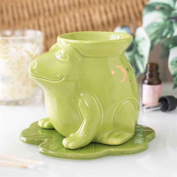 Ceramic oil burner shaped like a frog with a space at the back for a tealight