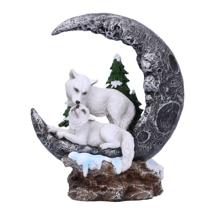 Two wolves perched on a crescent moon above a snowy landscape