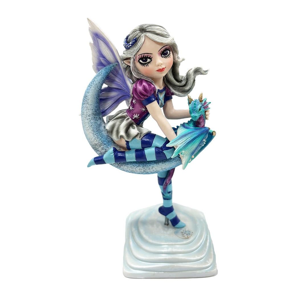 Winter fairy seated on a crescent moon cradling a small dragon