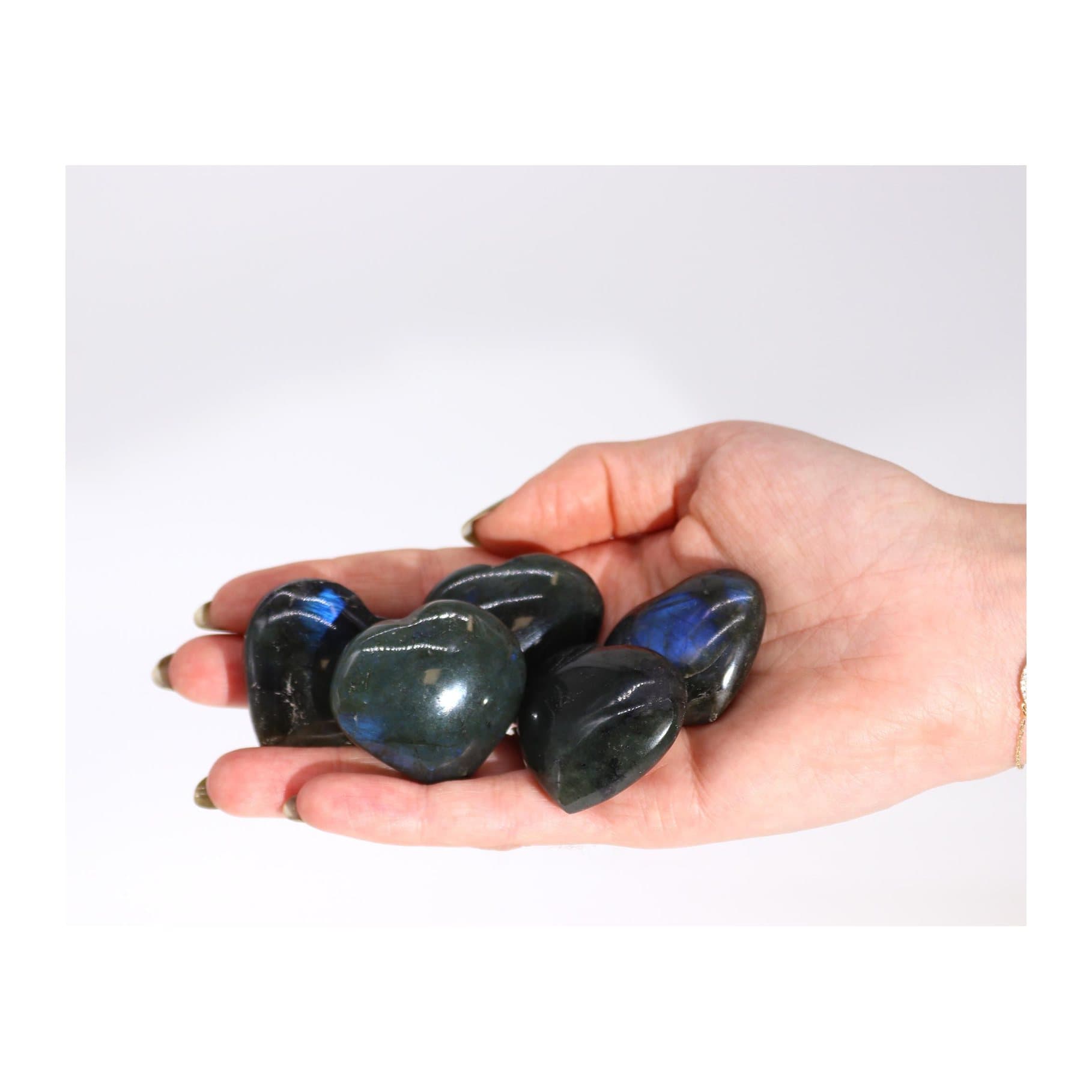 Heart-shaped labradorite stone with iridescent colours