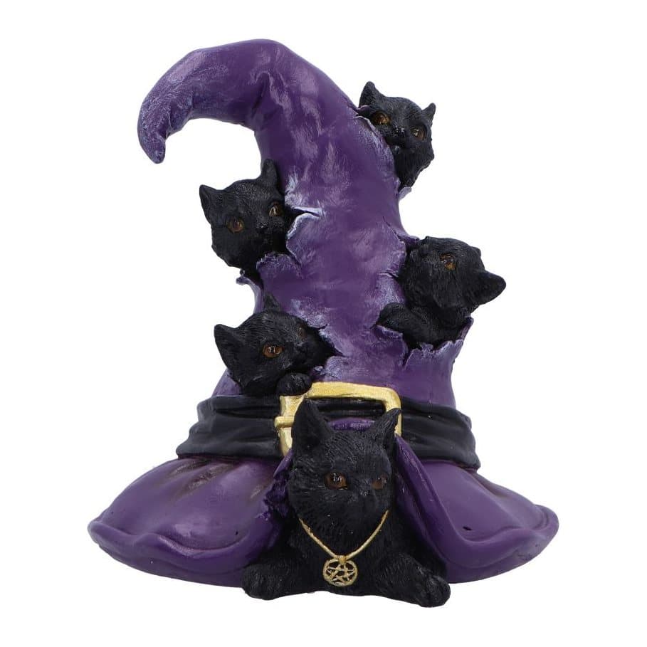 Purple witch hat torn by five black kittens with a larger kitten at the base