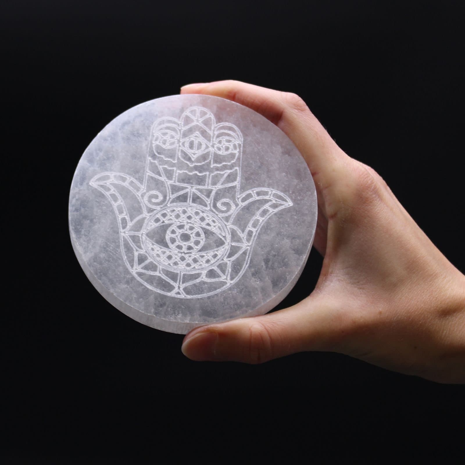 Medium selenite charging plate with a hamsa design