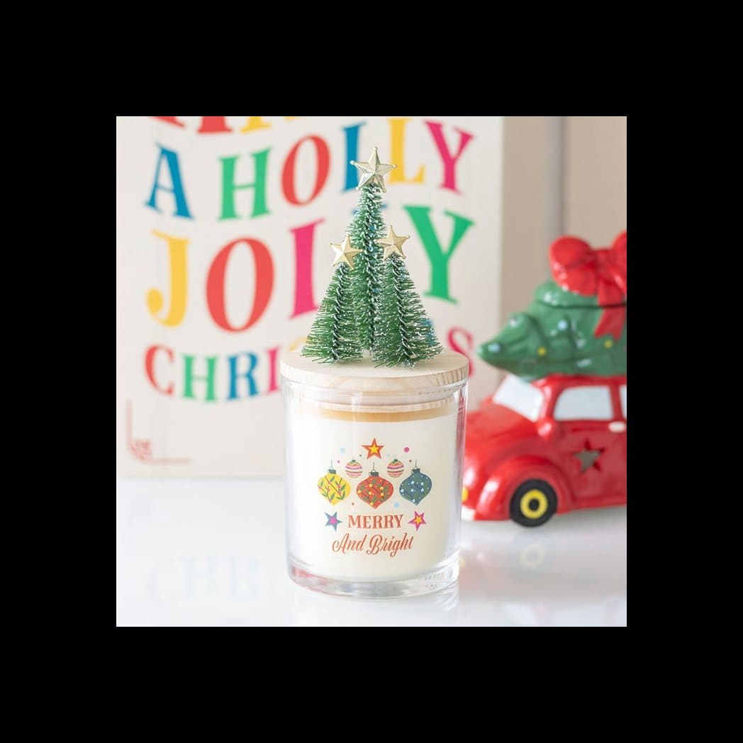 Merry and Bright glass candle with bauble print and wooden lid with a tree