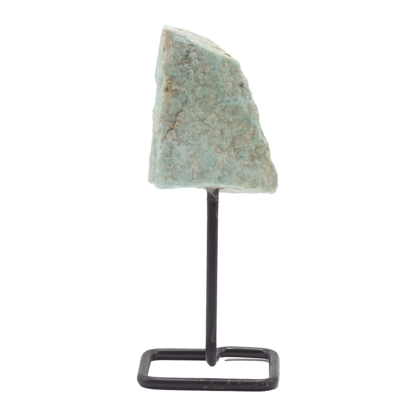 Raw pale green-blue amazonite specimen on a black metal stand