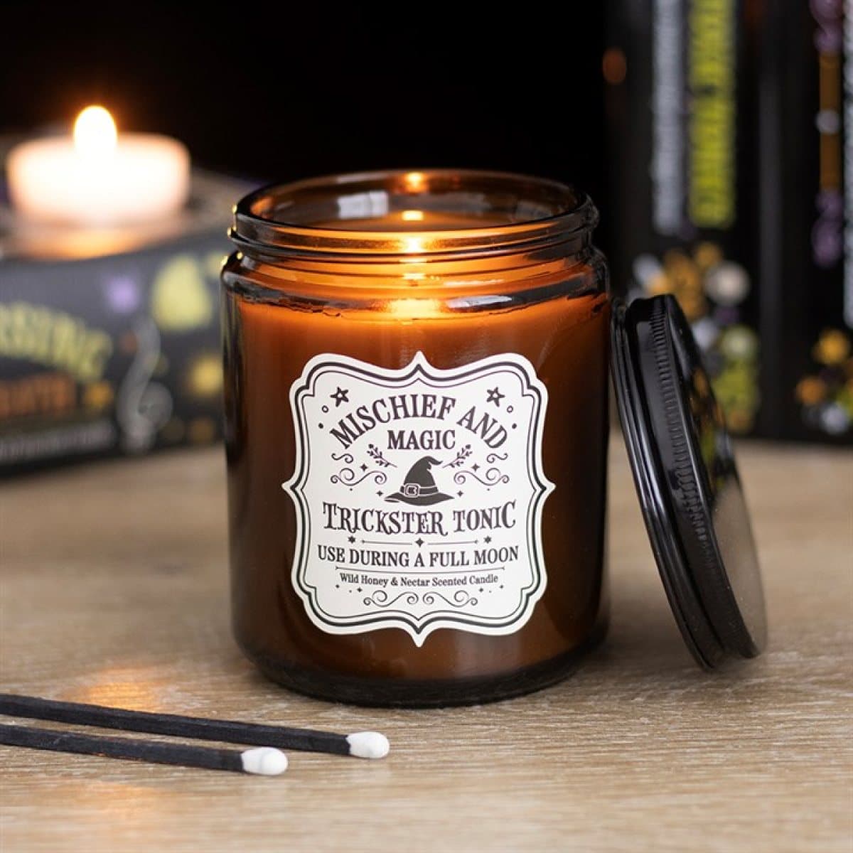 Wild honey and nectar candle in a glass apothecary-style jar