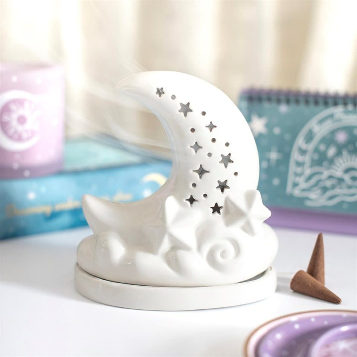 Ceramic moon incense cone holder with star cut-outs and cloud details