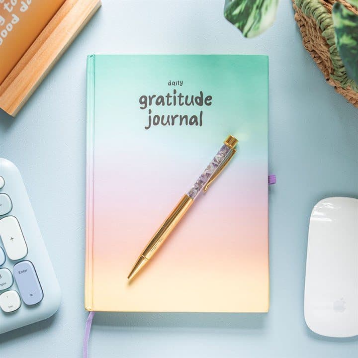 Multicoloured gratitude journal with a matching amethyst pen