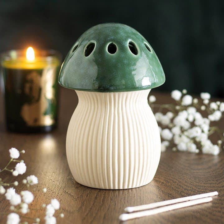 Ceramic mushroom shaped oil burner with a removable cap