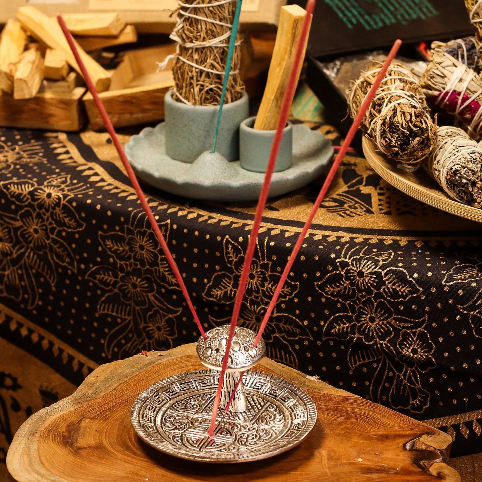 Silver effect aluminium mushroom incense holder with a patterned base