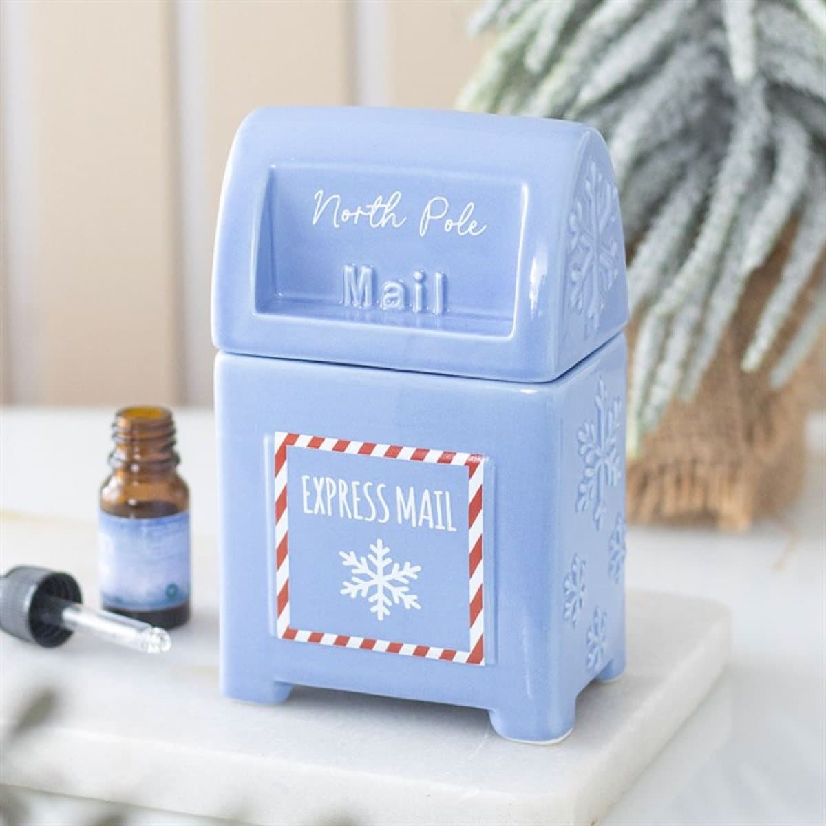 Blue ceramic postbox oil burner with snowy cut-out details