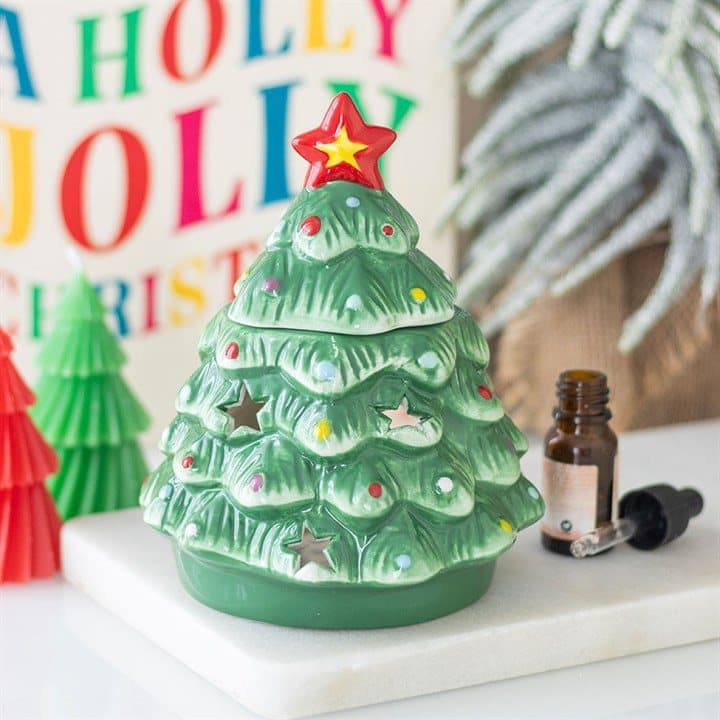 Ceramic oil burner shaped like a traditional Christmas tree